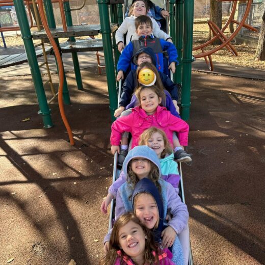 Kids going down a slide.